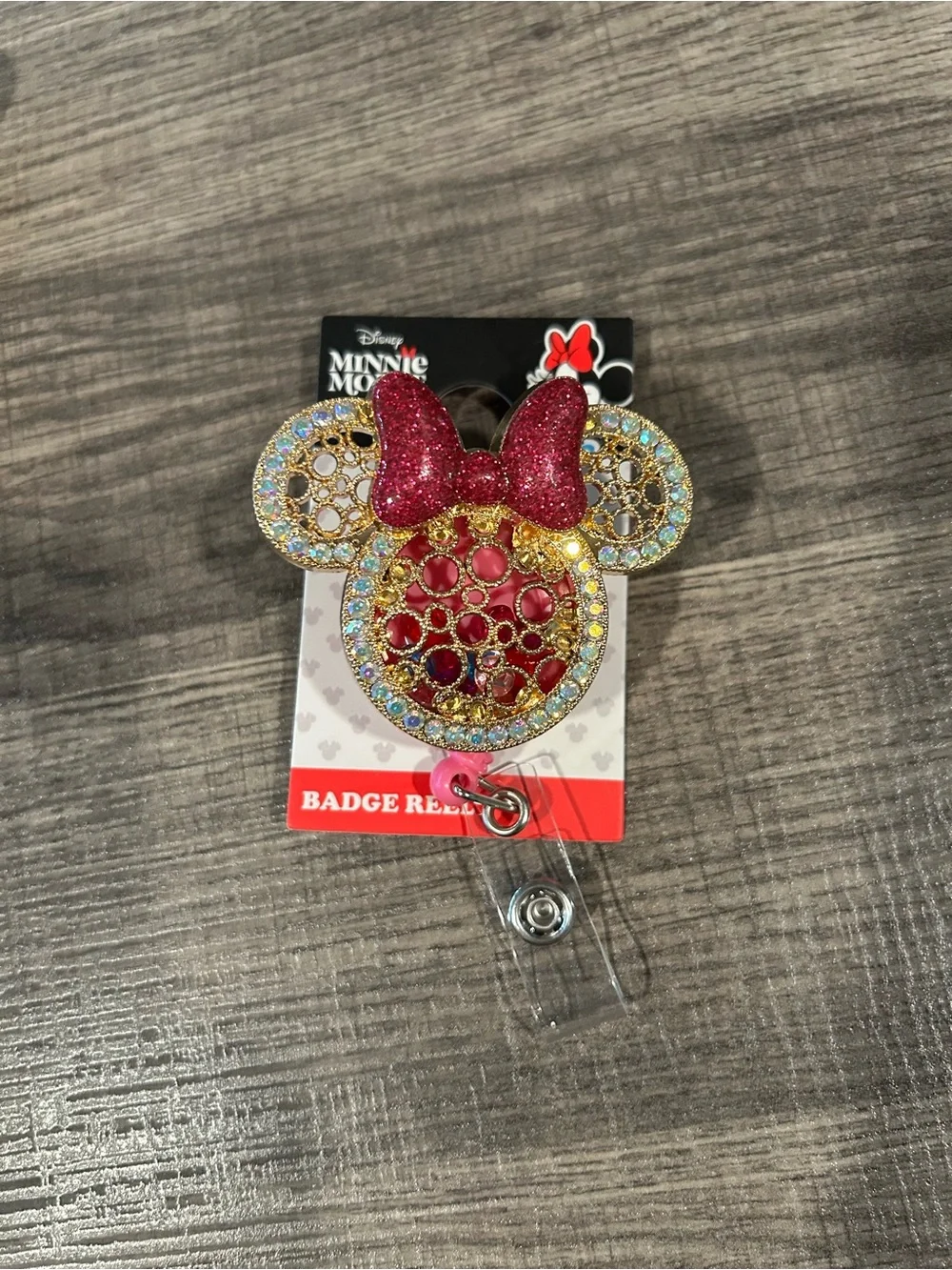 Disney Minnie Mouse Gold-Tone Badge Reel with Red Glitter Bow